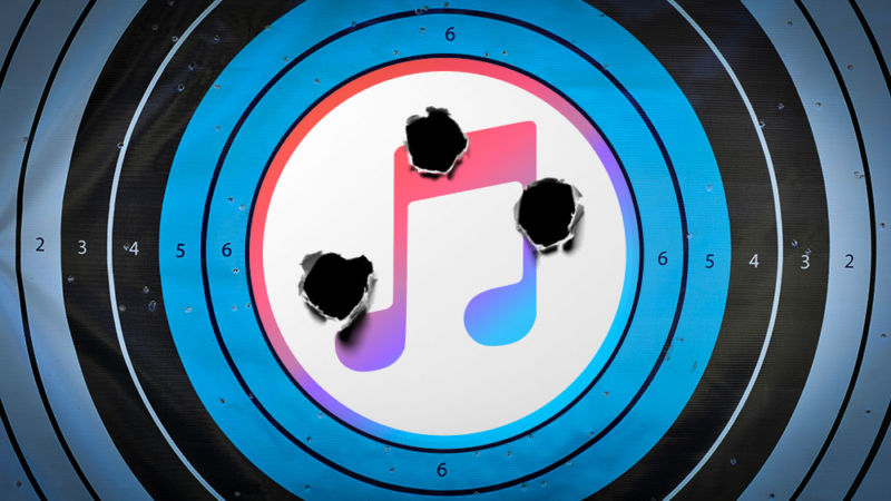 El logotipo de iTunes se retocó con Photoshop en un objetivo de pistola que se disparó varias veces.