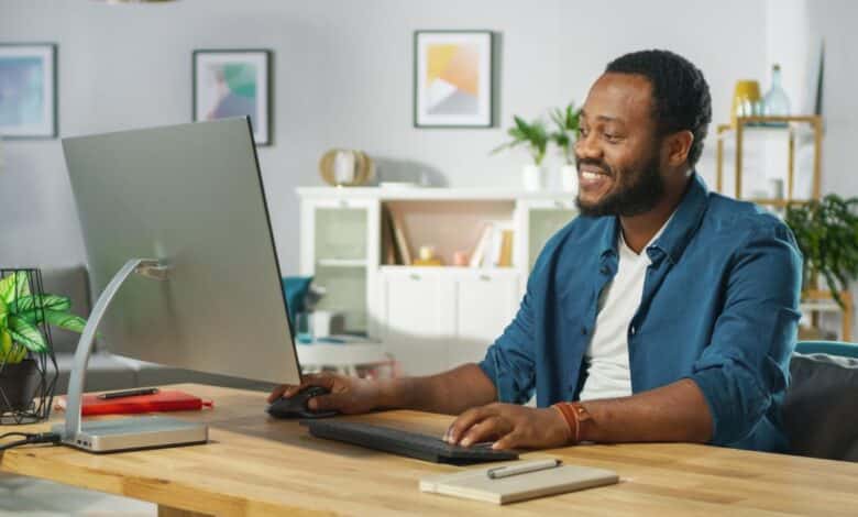 A person using a desktop computer.
